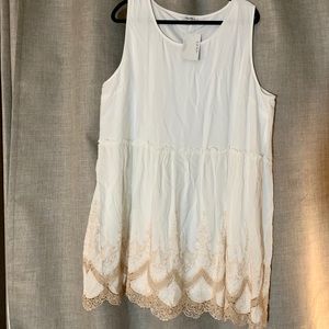 Sleeveless white dress w/ gold embroidered detail